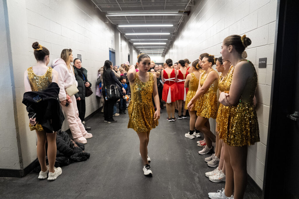 A group of athletes competing in athletic event sports