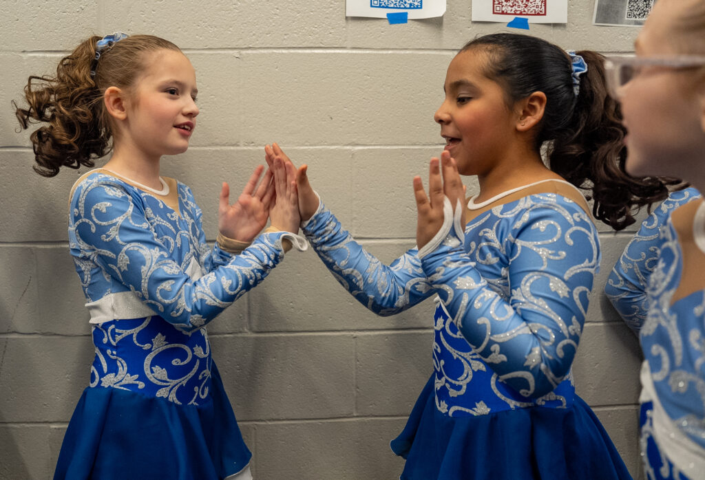 A group of athletes competing in athletic event sports