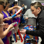 A group of athletes competing in athletic event sports