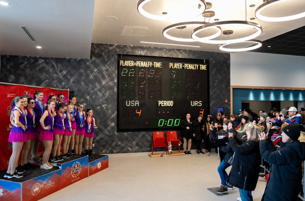 A group of athletes competing in athletic event sports