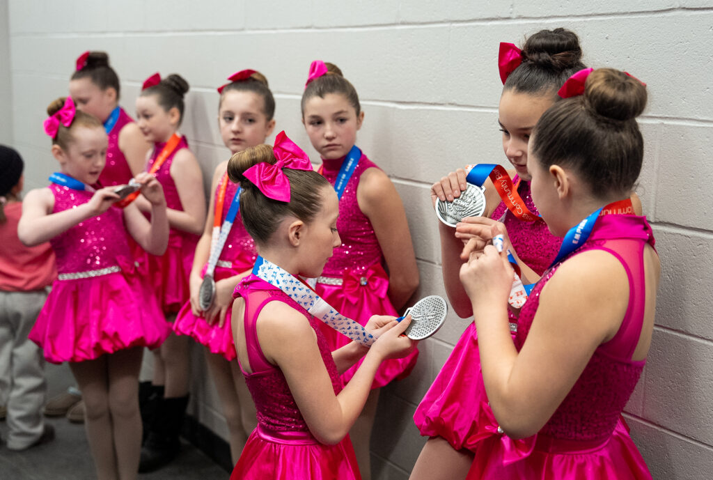 A group of athletes competing in athletic event sports