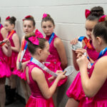 A group of athletes competing in athletic event sports