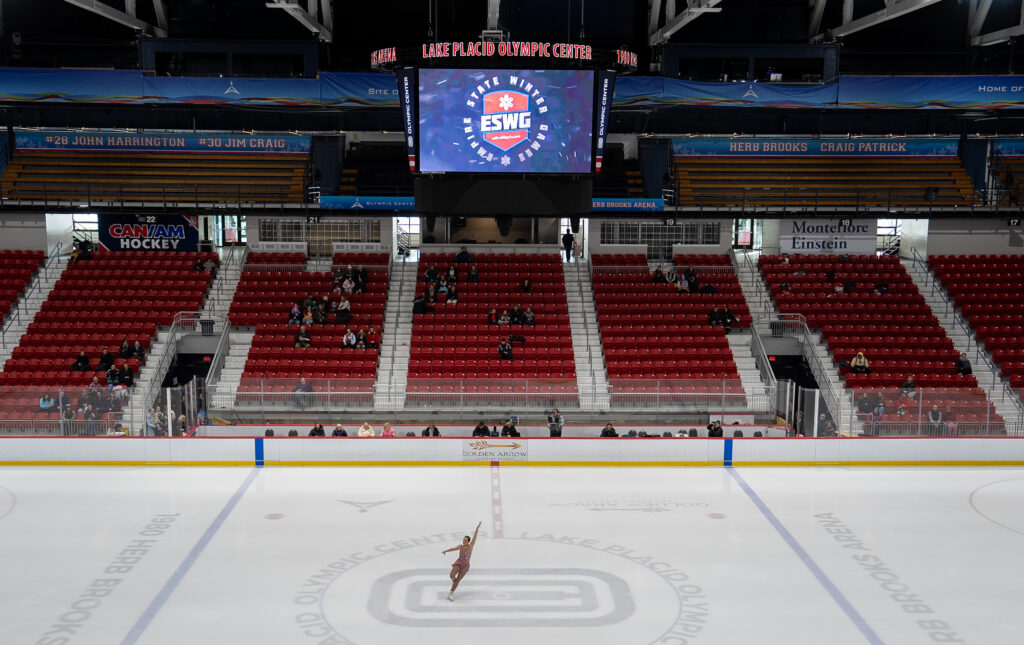 A group of athletes competing in athletic event sports