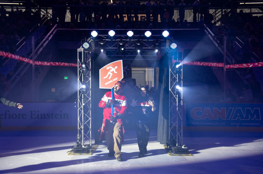 A group of athletes competing in athletic event sports