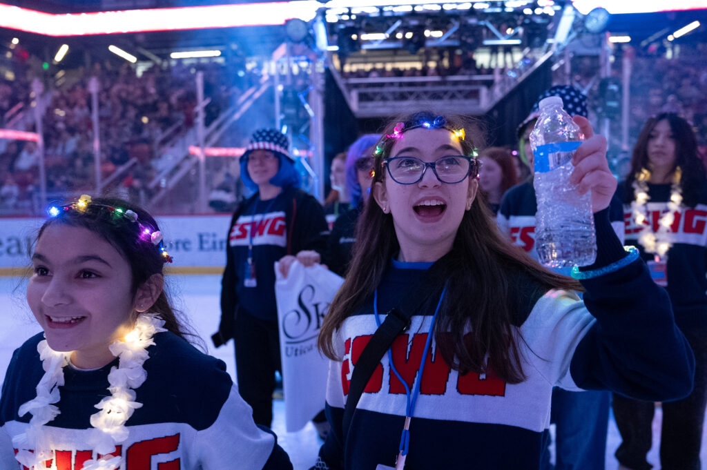 A group of athletes competing in athletic event sports