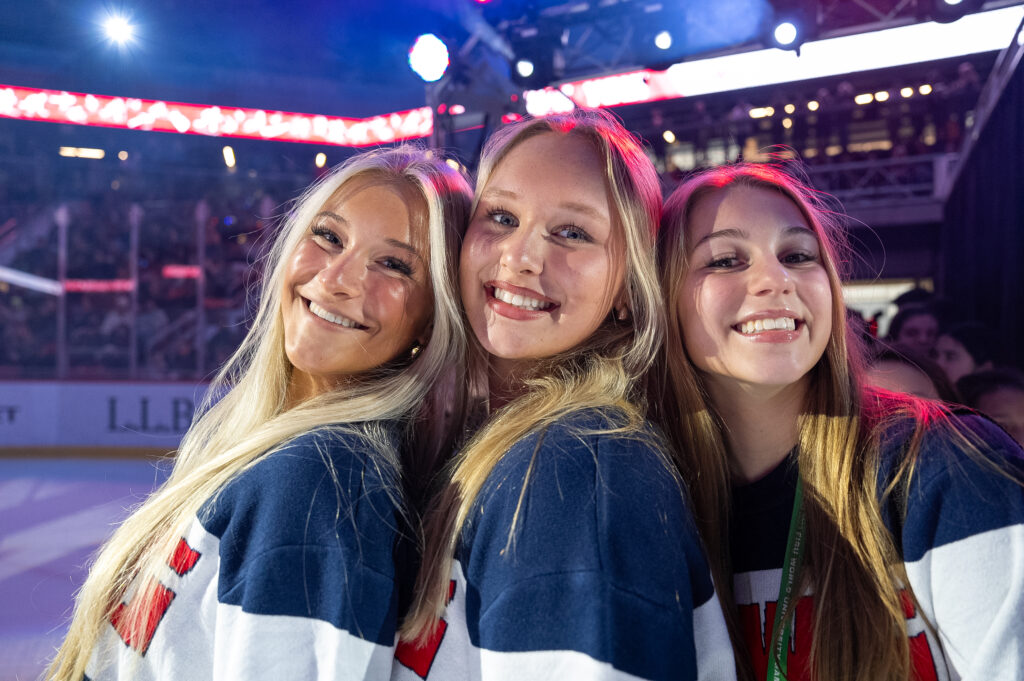 A group of athletes competing in athletic event sports