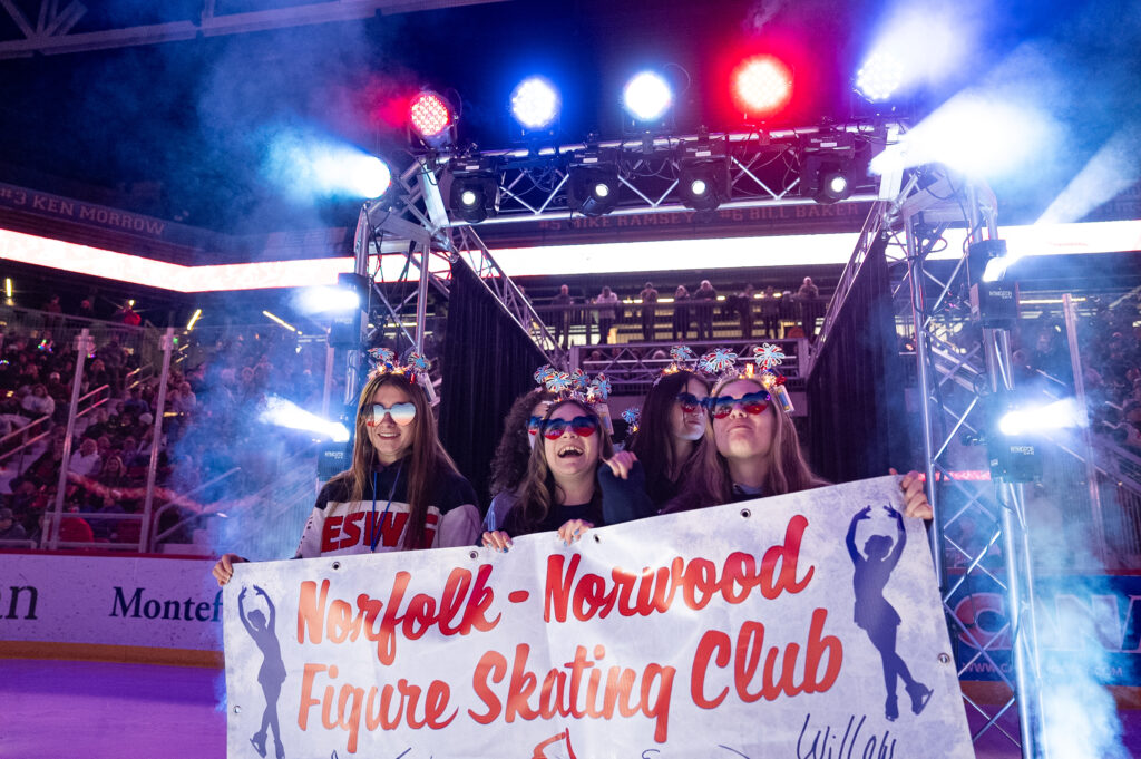 A group of athletes competing in athletic event sports