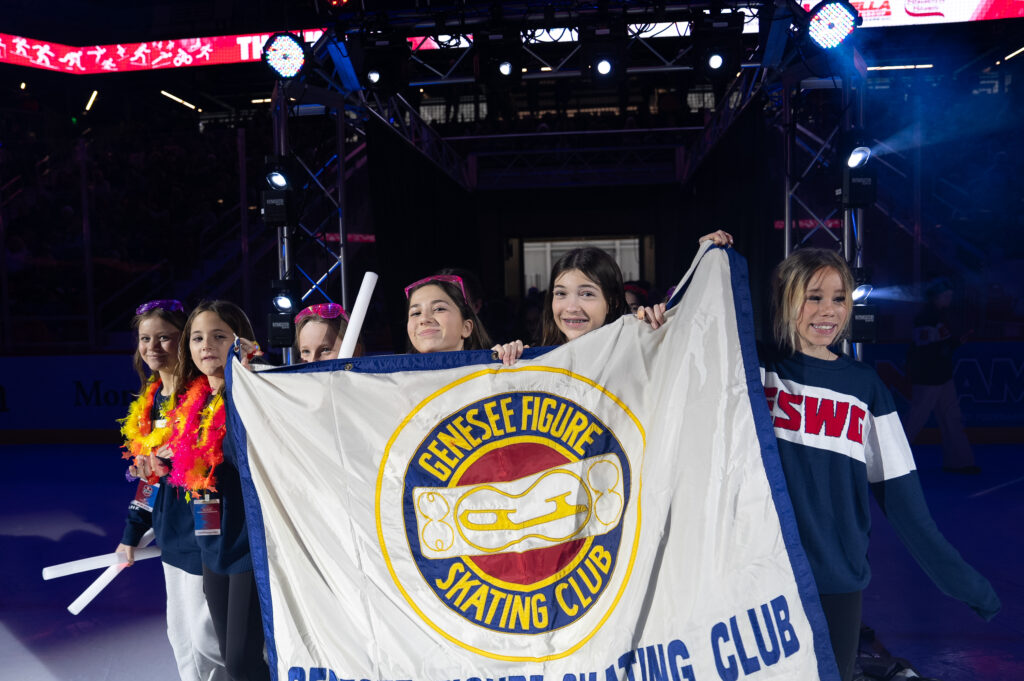 A group of athletes competing in athletic event sports