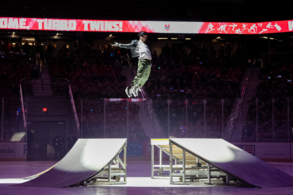 A group of athletes competing in athletic event sports