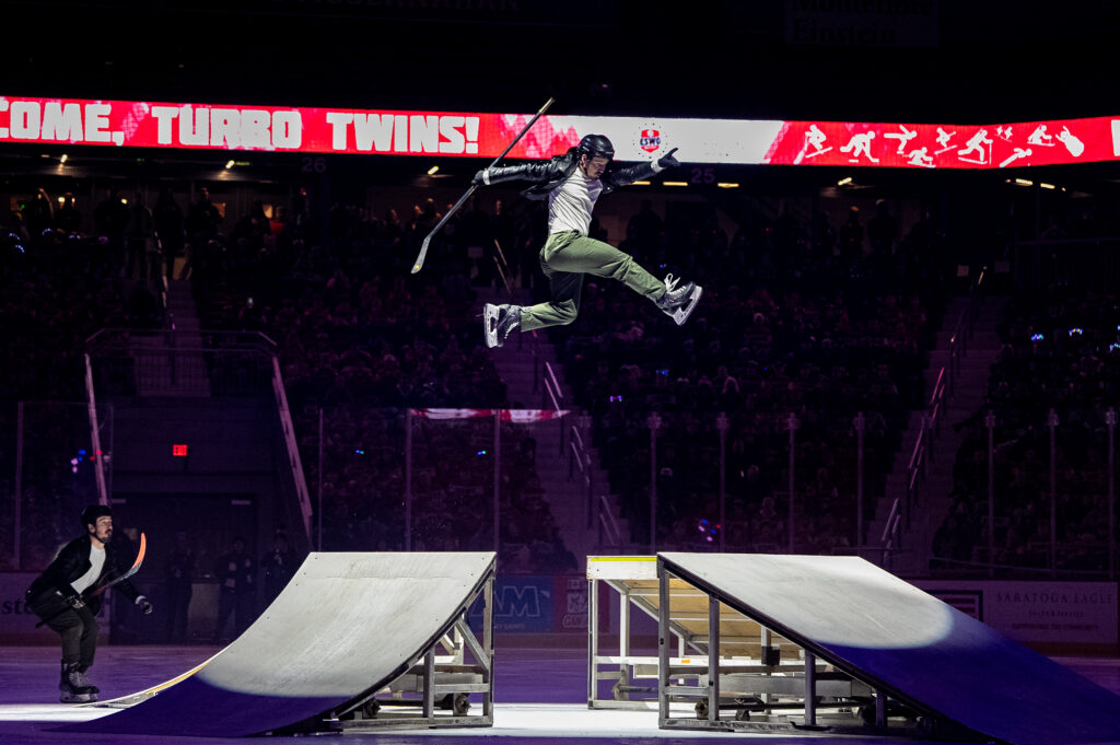 A group of athletes competing in athletic event sports with helmet