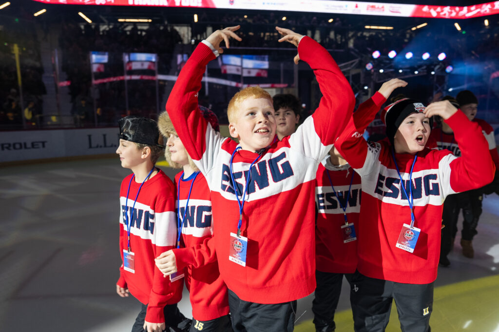 A group of athletes competing in athletic event sports