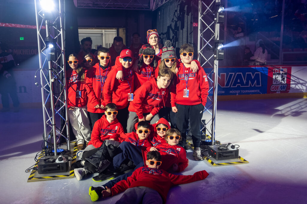 A group of athletes competing in athletic event sports