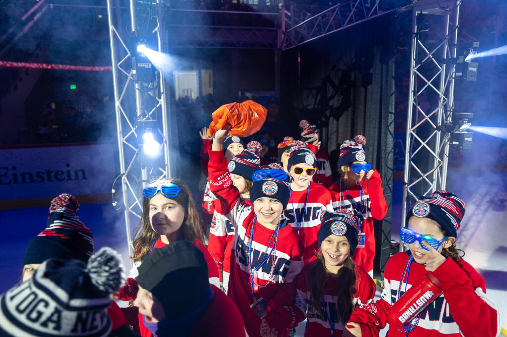 A group of athletes competing in athletic event sports