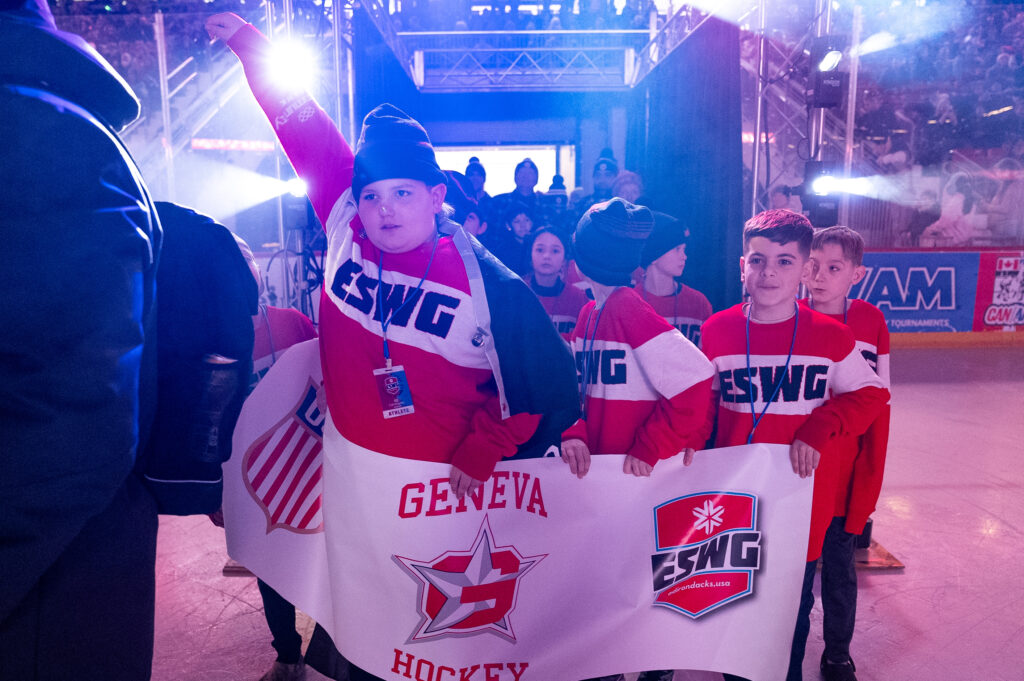 A group of athletes competing in athletic event sports