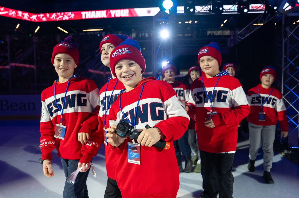 A group of athletes competing in athletic event sports