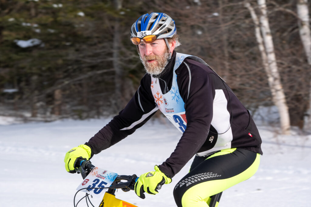 An athlete competing in athletic event sports with helmet