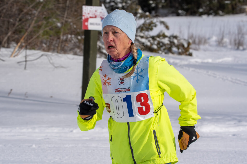 An athlete competing in athletic event sports in the snow