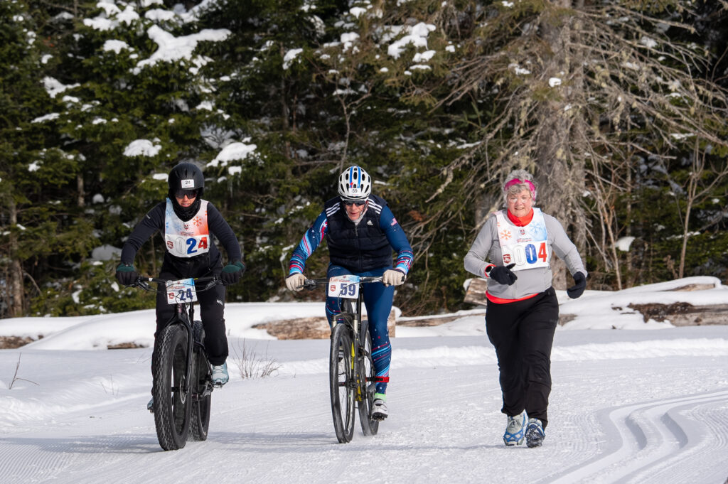 A group of athletes competing in athletic event sports with helmet