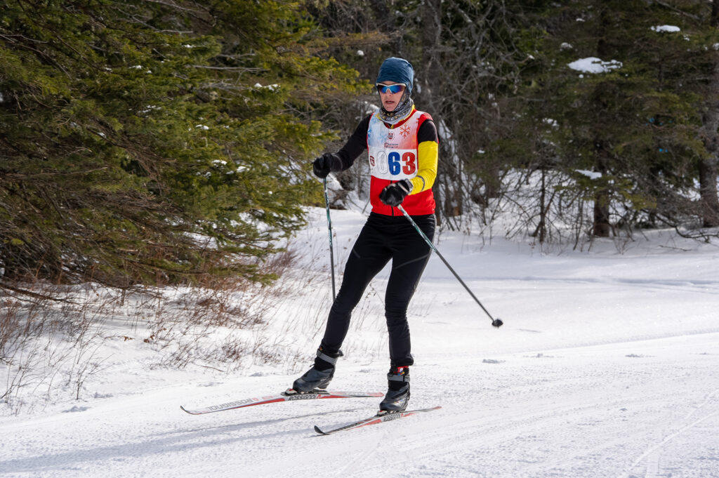 An athlete skiing in the snow