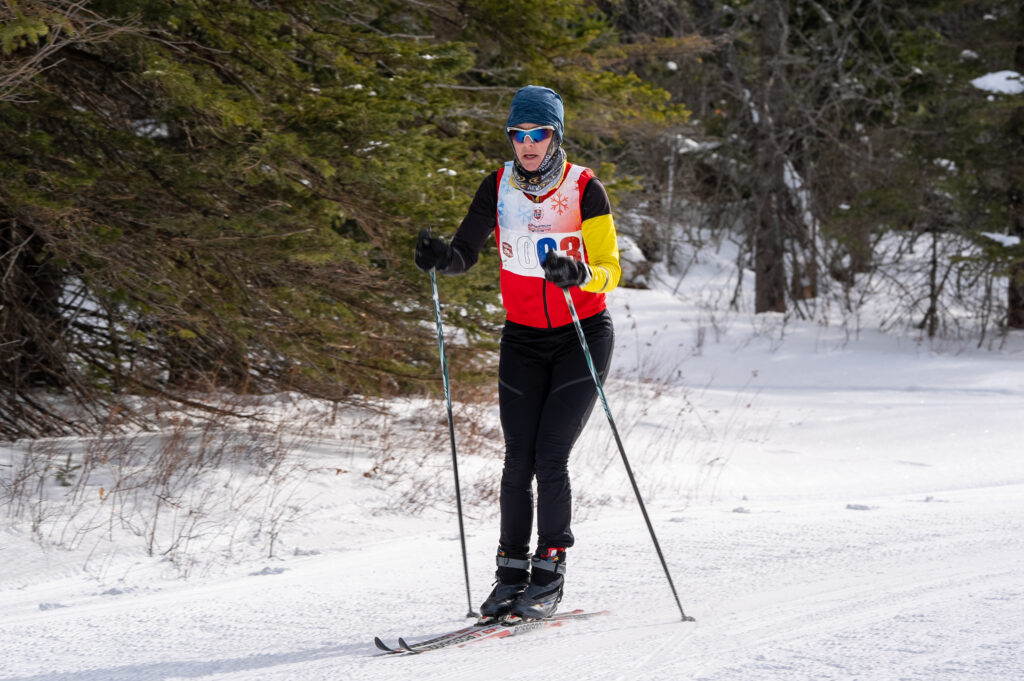 An athlete skiing in the snow