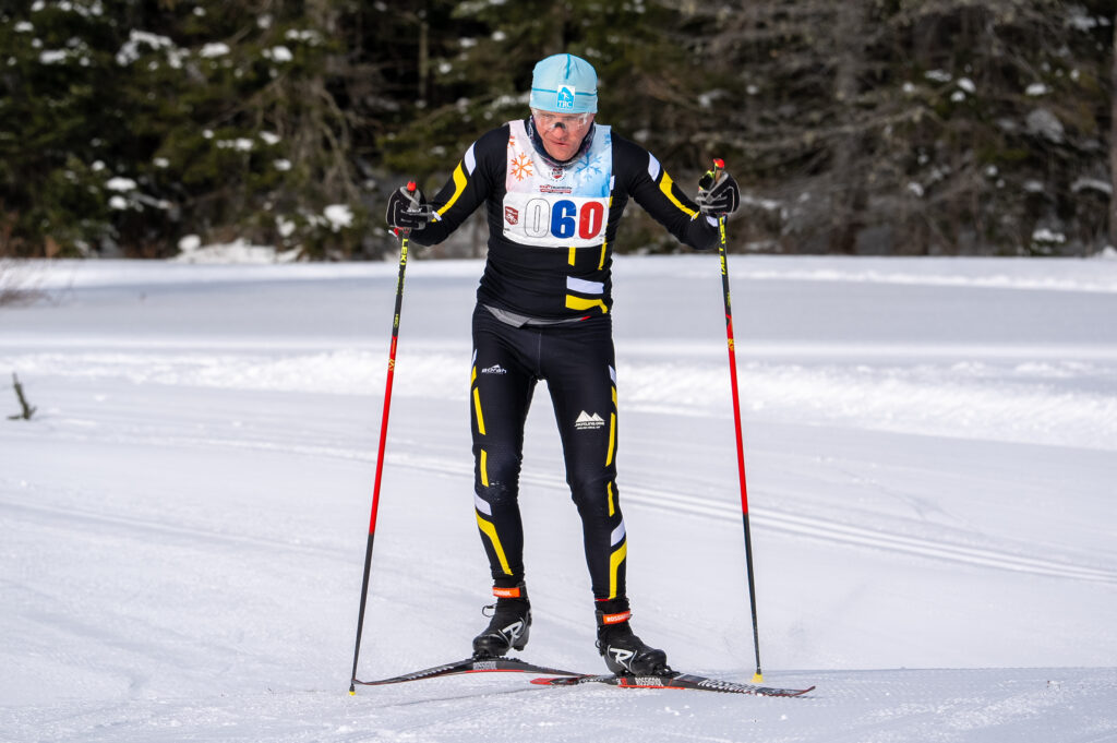 An athlete skiing in the snow