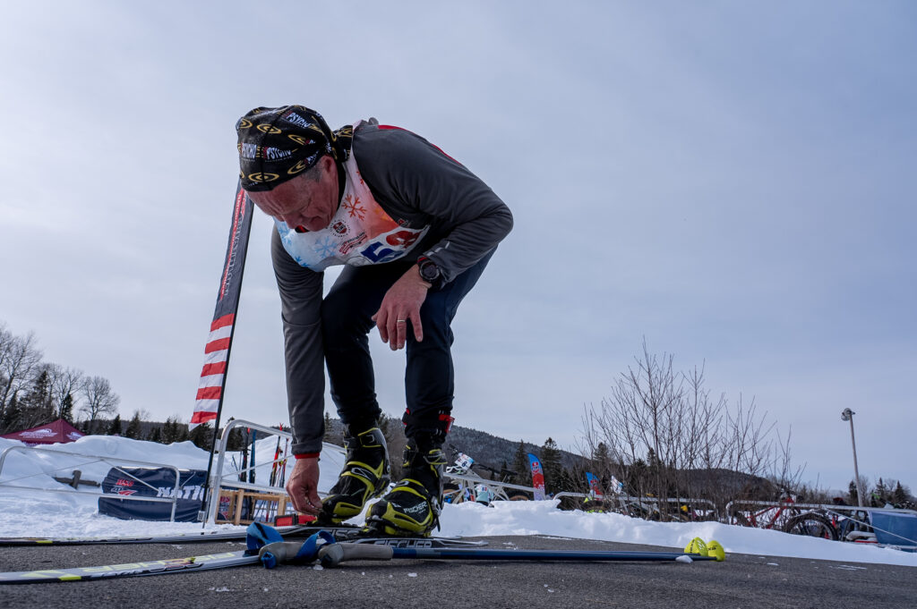 A group of athletes competing in athletic event sports in the snow