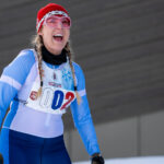 An athlete competing in athletic event sports