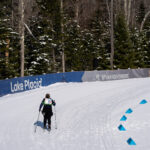 A group of athletes competing in athletic event sports in the snow