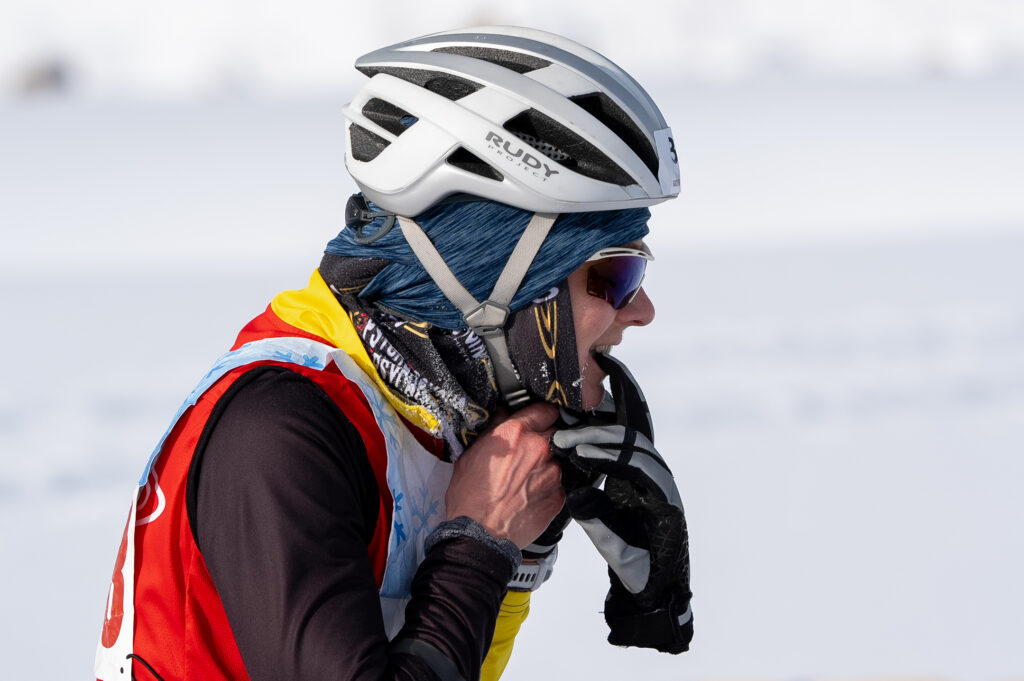 An athlete competing in athletic event sports with helmet