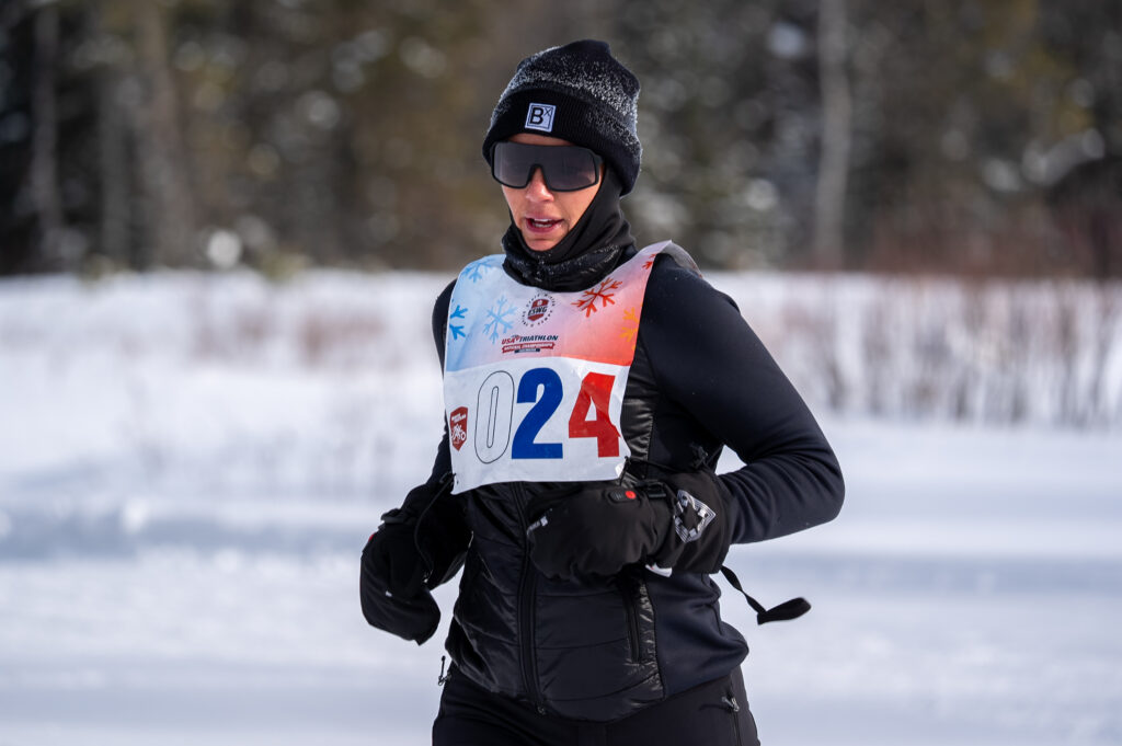 An athlete competing in athletic event sports in the snow