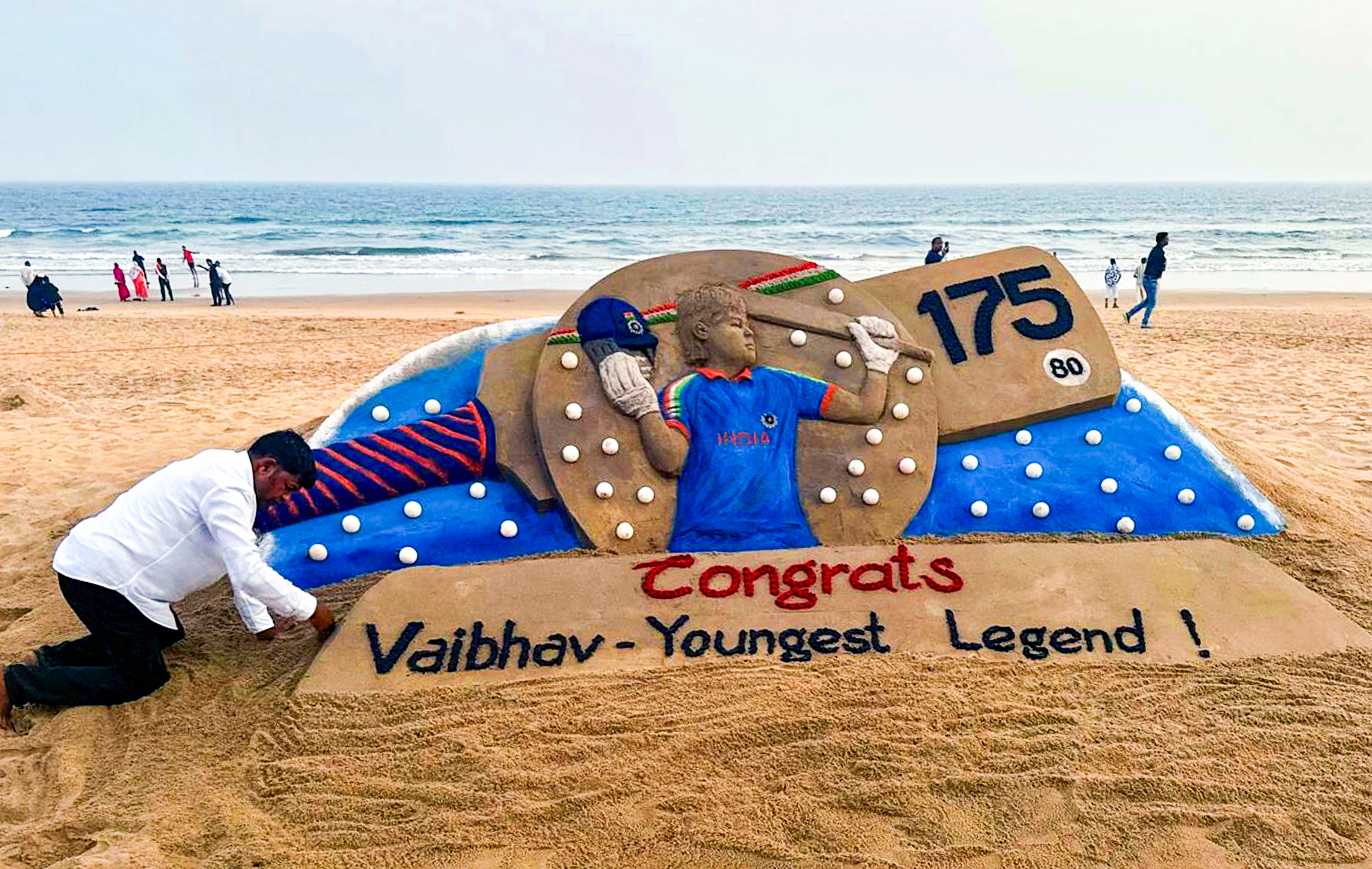 Puri: Renowned sand artist and Padma Shri awardee Sudarsan Pattnaik creates a sand sculpture at Puri Beach to celebrate the victory of India’s Under-19 cricket team, in Puri, Odisha on Saturday, February 07, 2026. (Photo: IANS)